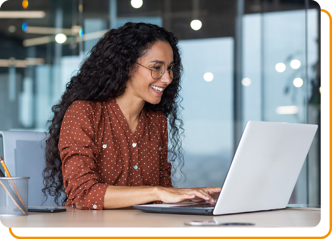 Image of a business professional working on a laptop