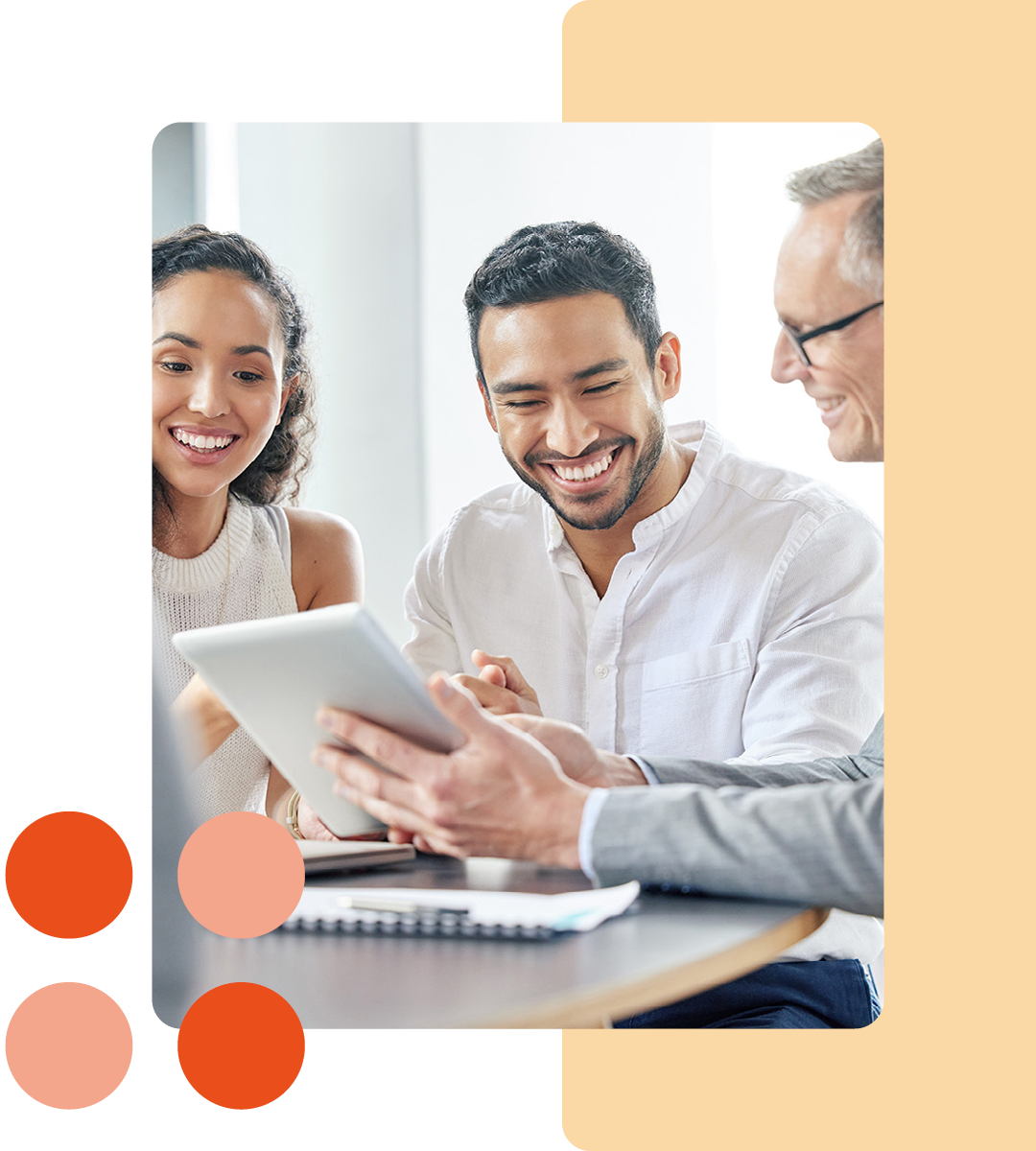 Image of a group of business professionals collaborating on a tablet