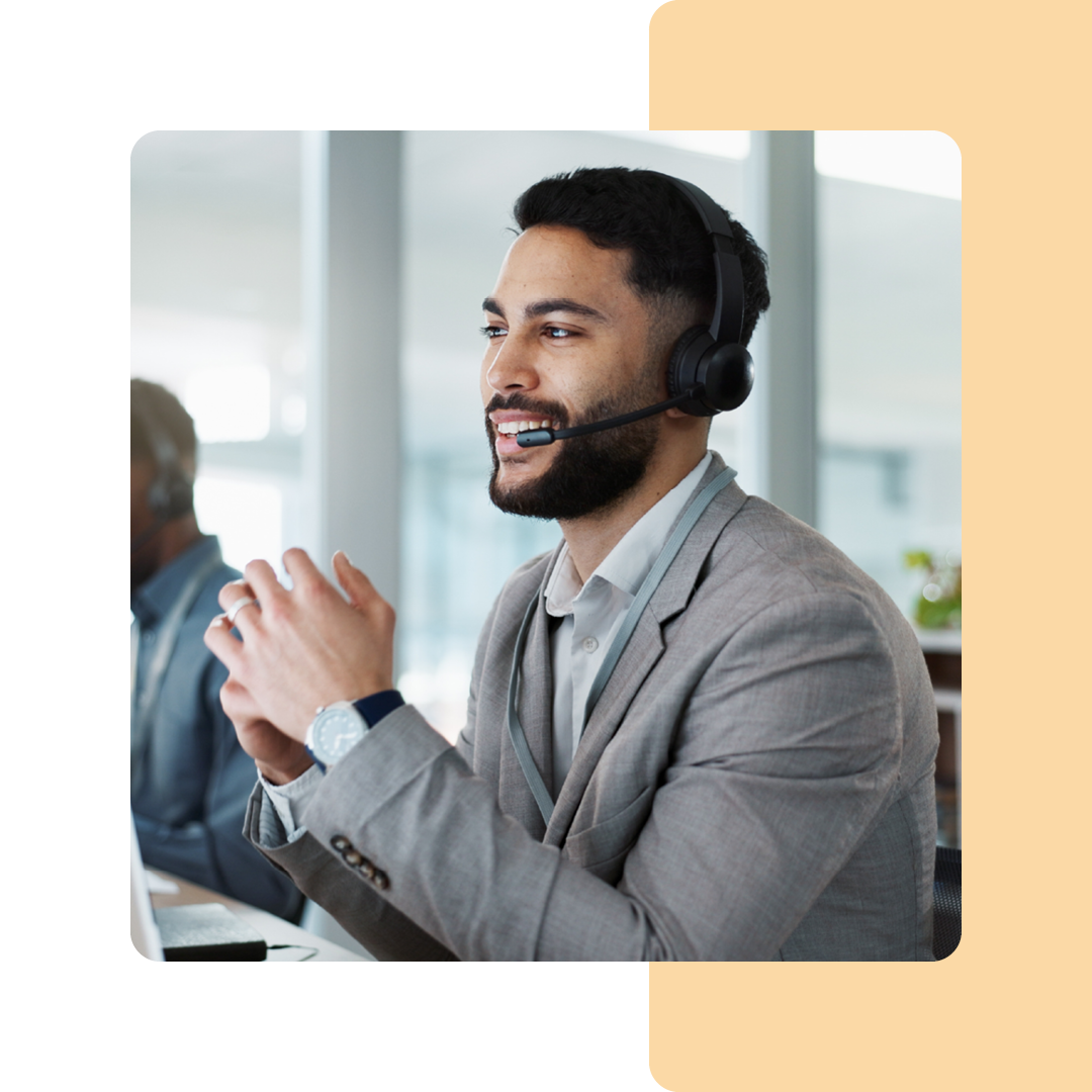 Image of an IT support professional talking on a headset