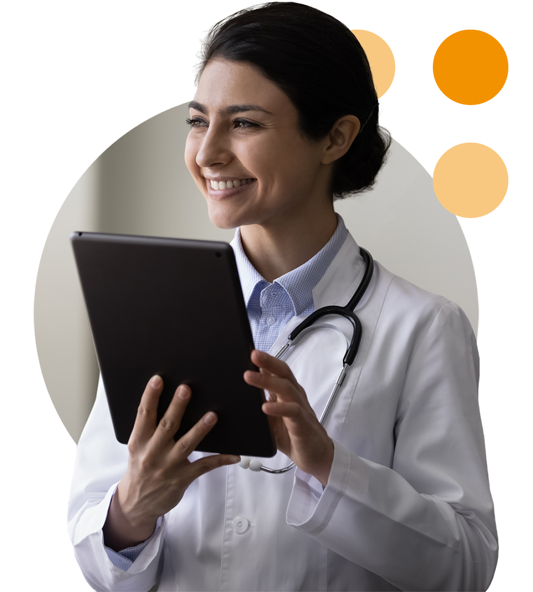 Image of a smiling doctor holding a tablet