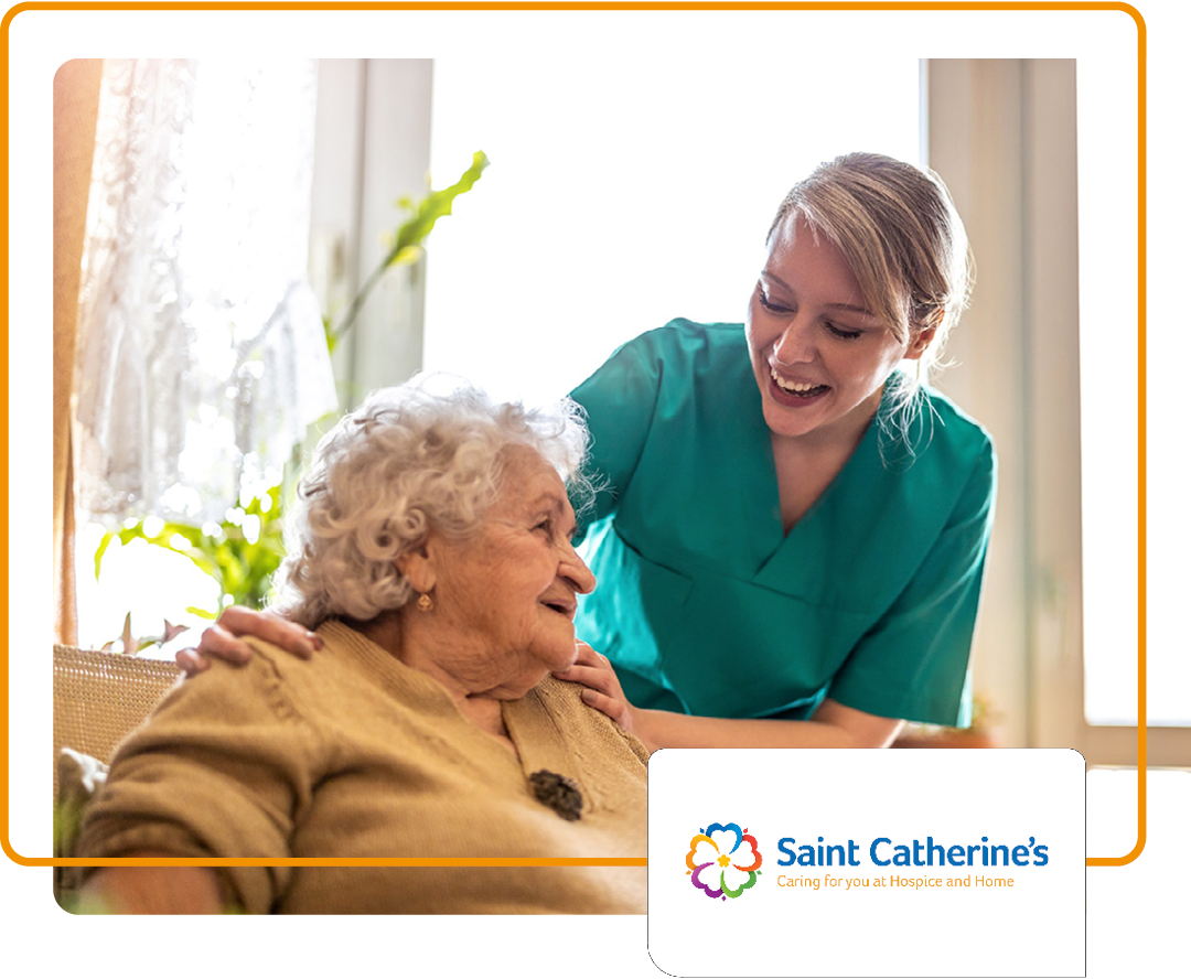 Image of a hospice carer talking to a patient with the Saint Catherine's Hospice logo