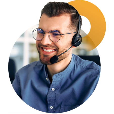 Image of a smiling person talking with a headset on