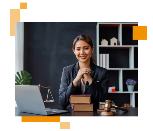 Image of a legal professional sat at a desk