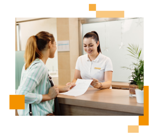 Image of a person working at a leisure centre serving a customer