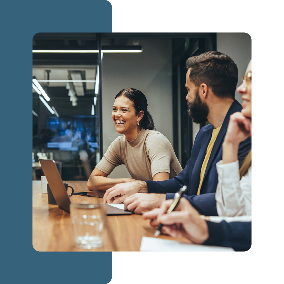 Image of a group of colleagues sat in a meeting together