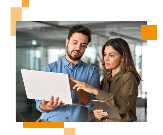 Image of a two business professionals working on a laptop