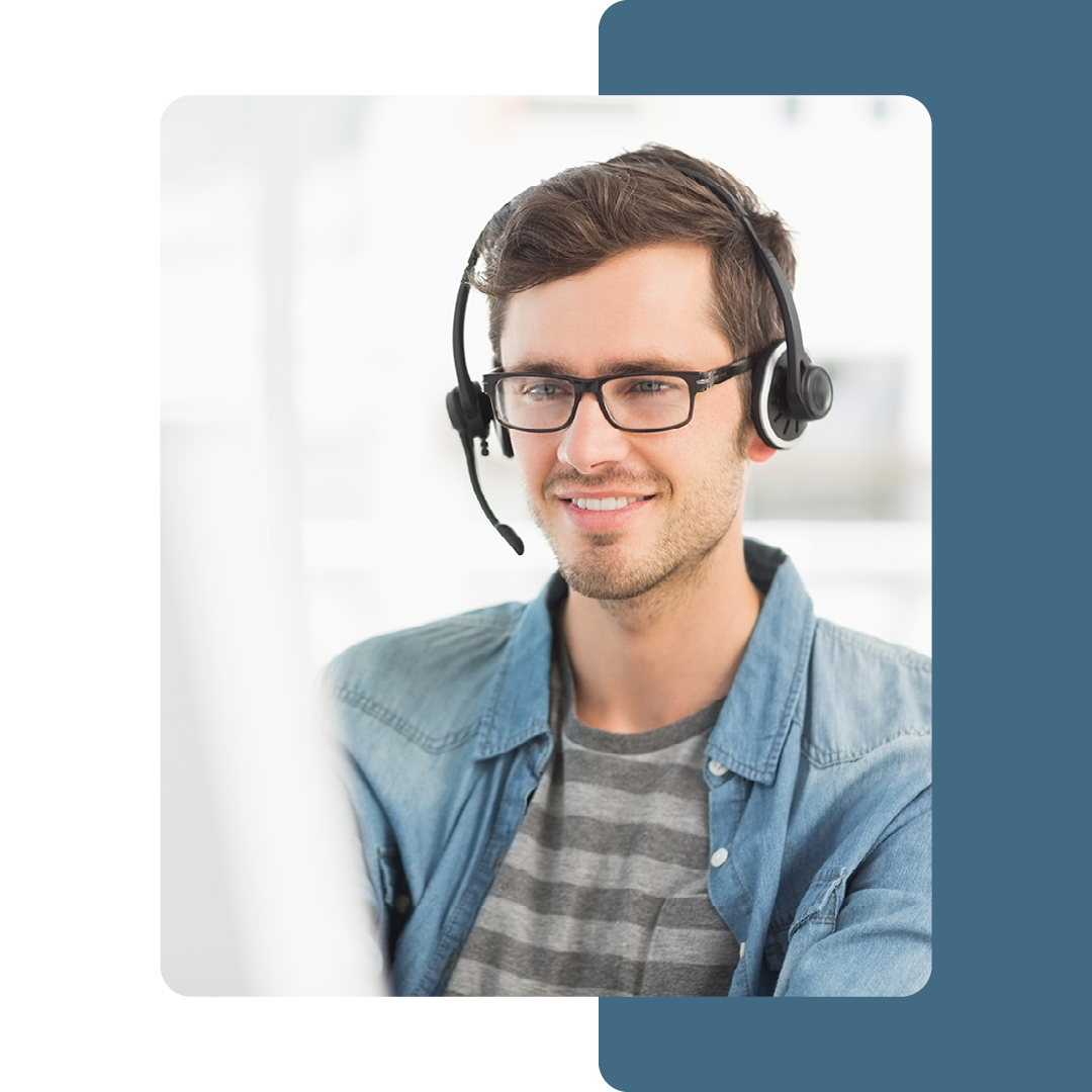 Image of a smiling IT support professional talking on a headset