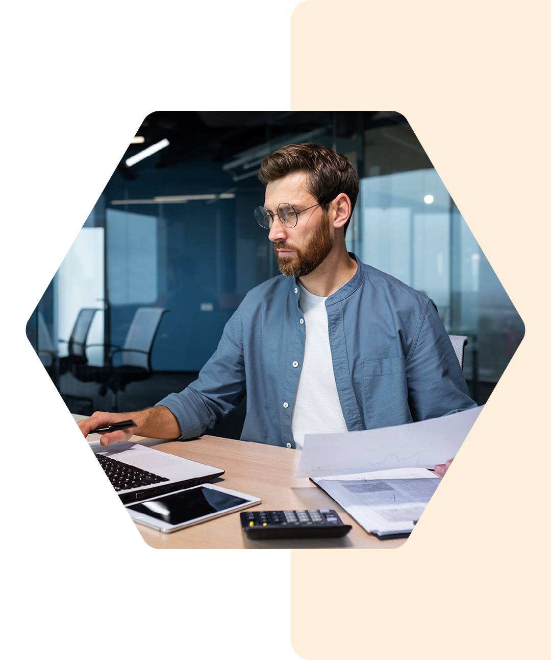 Image of a smiling business professional working on a laptop