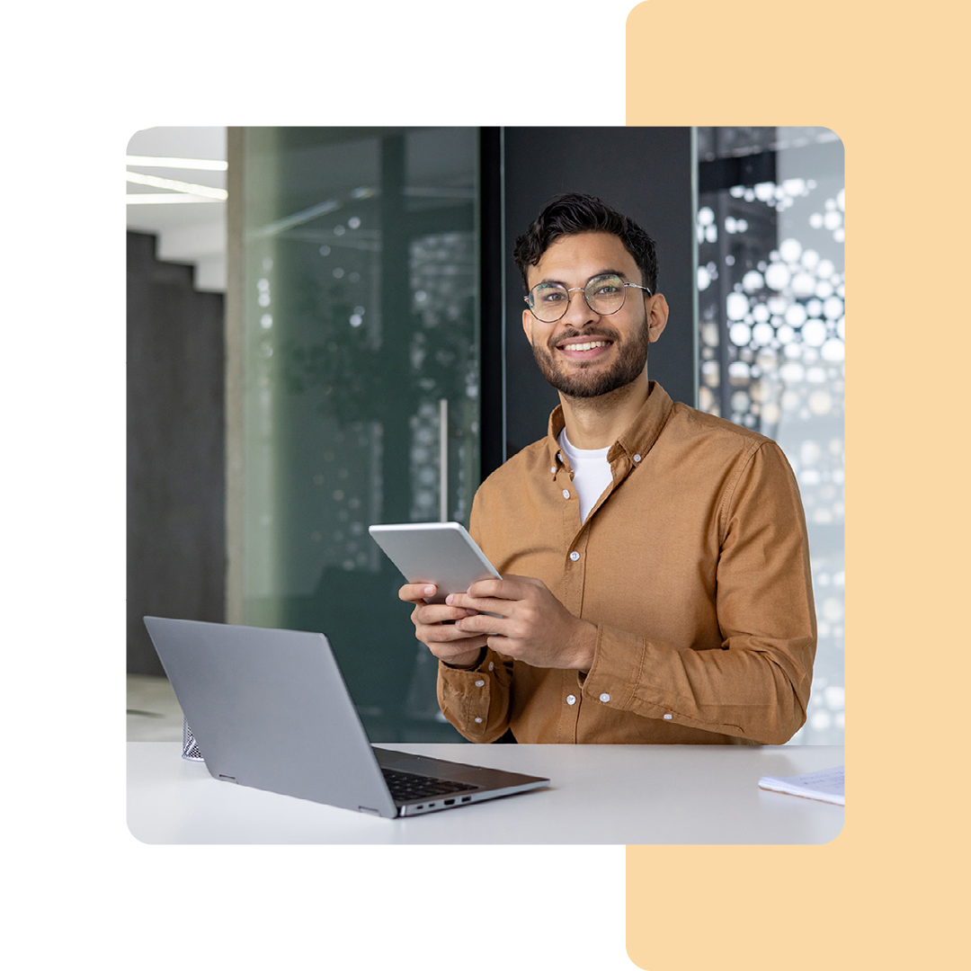 Image of an IT professional working on a laptop