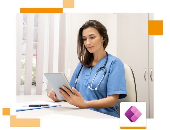 Image of a doctor sat in an office holding a tablet