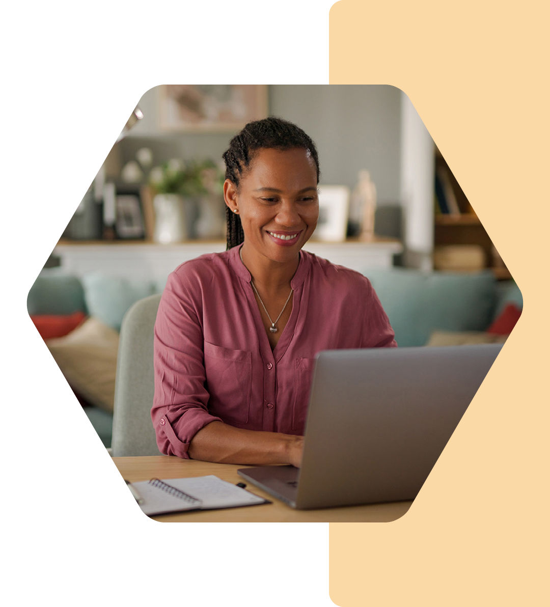 Image of a remote worker working on a laptop