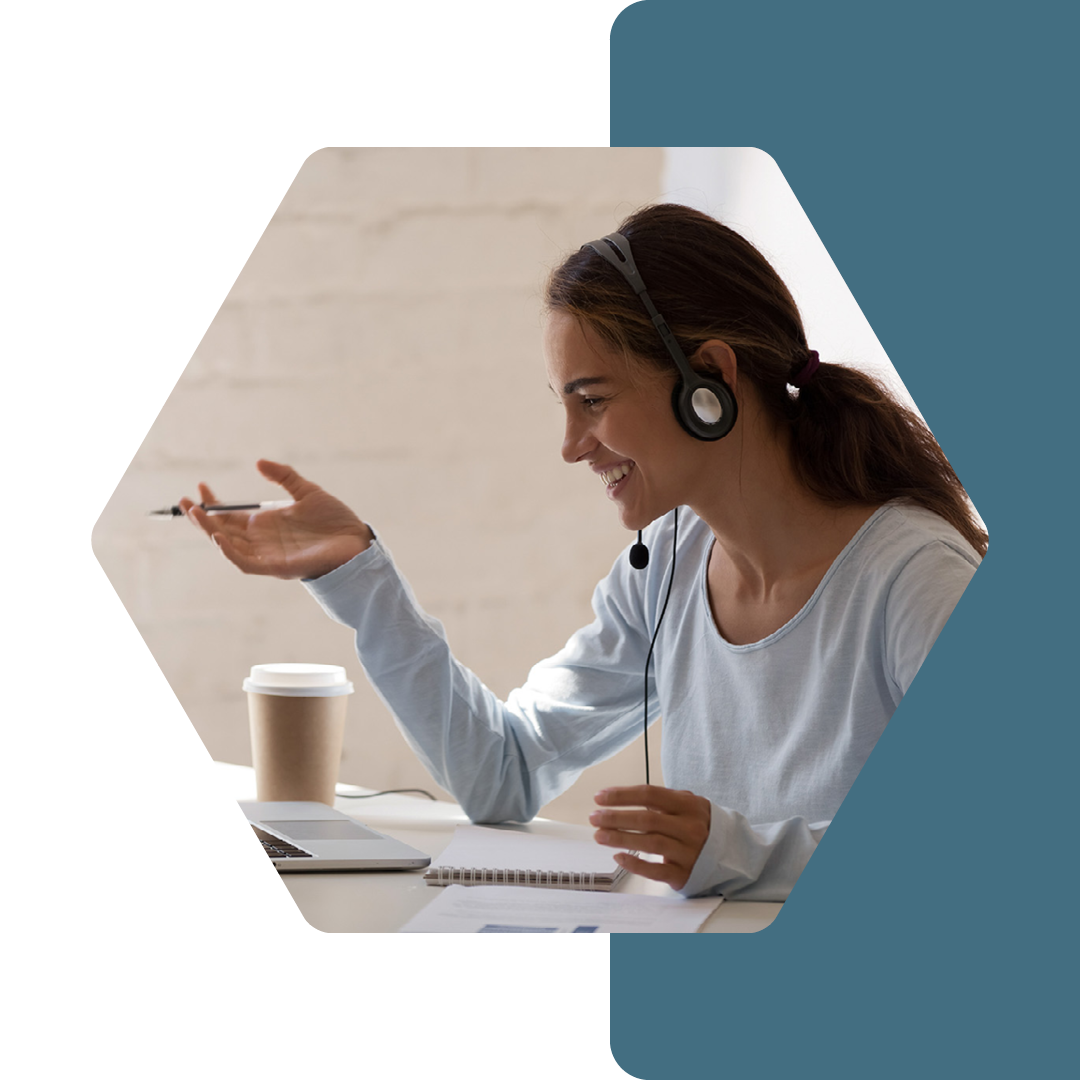 Image of a person working remotely with a headset on