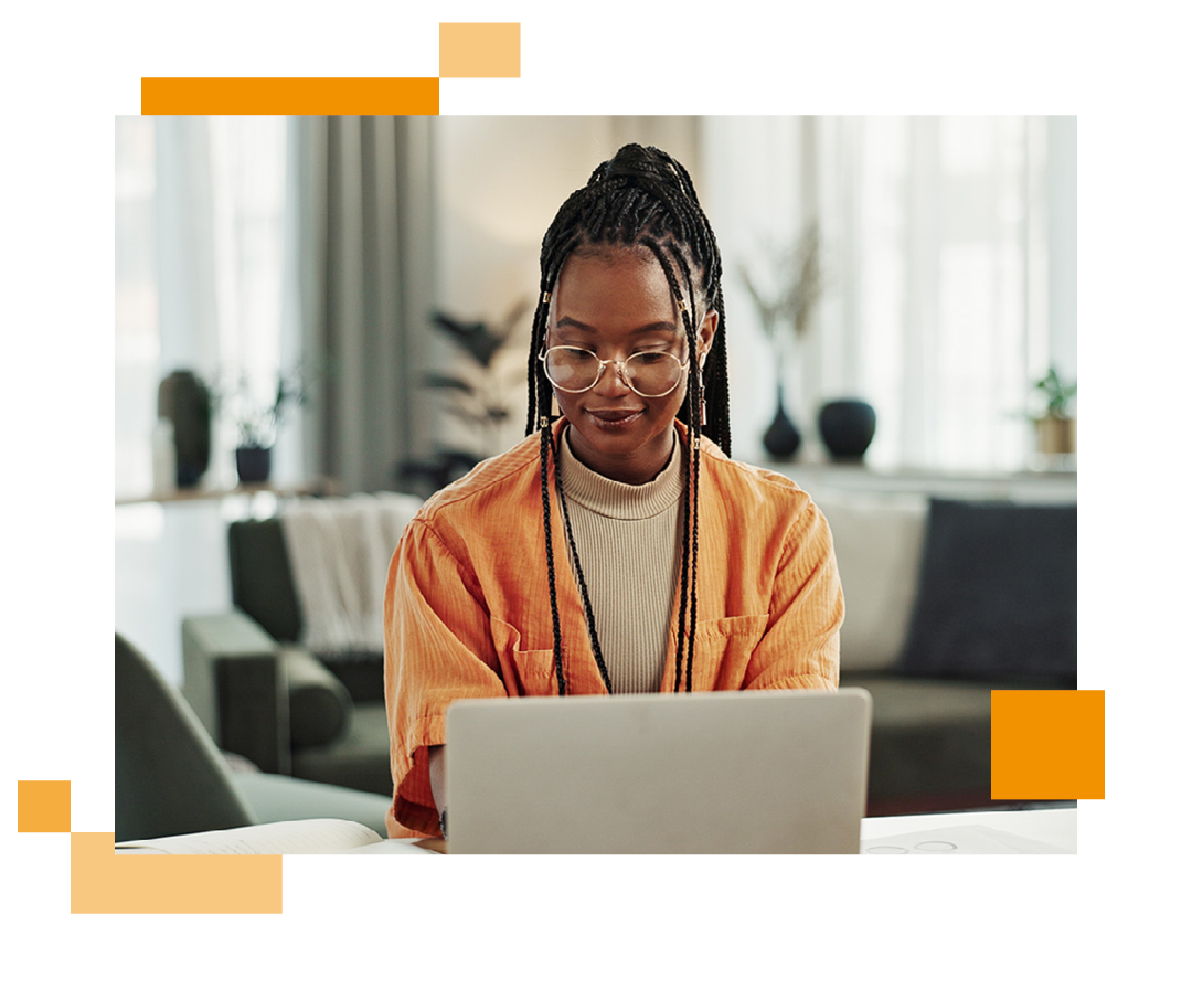 Image of a remote worker using a laptop at home