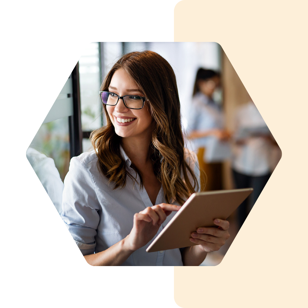 Image of a smiling person on a tablet