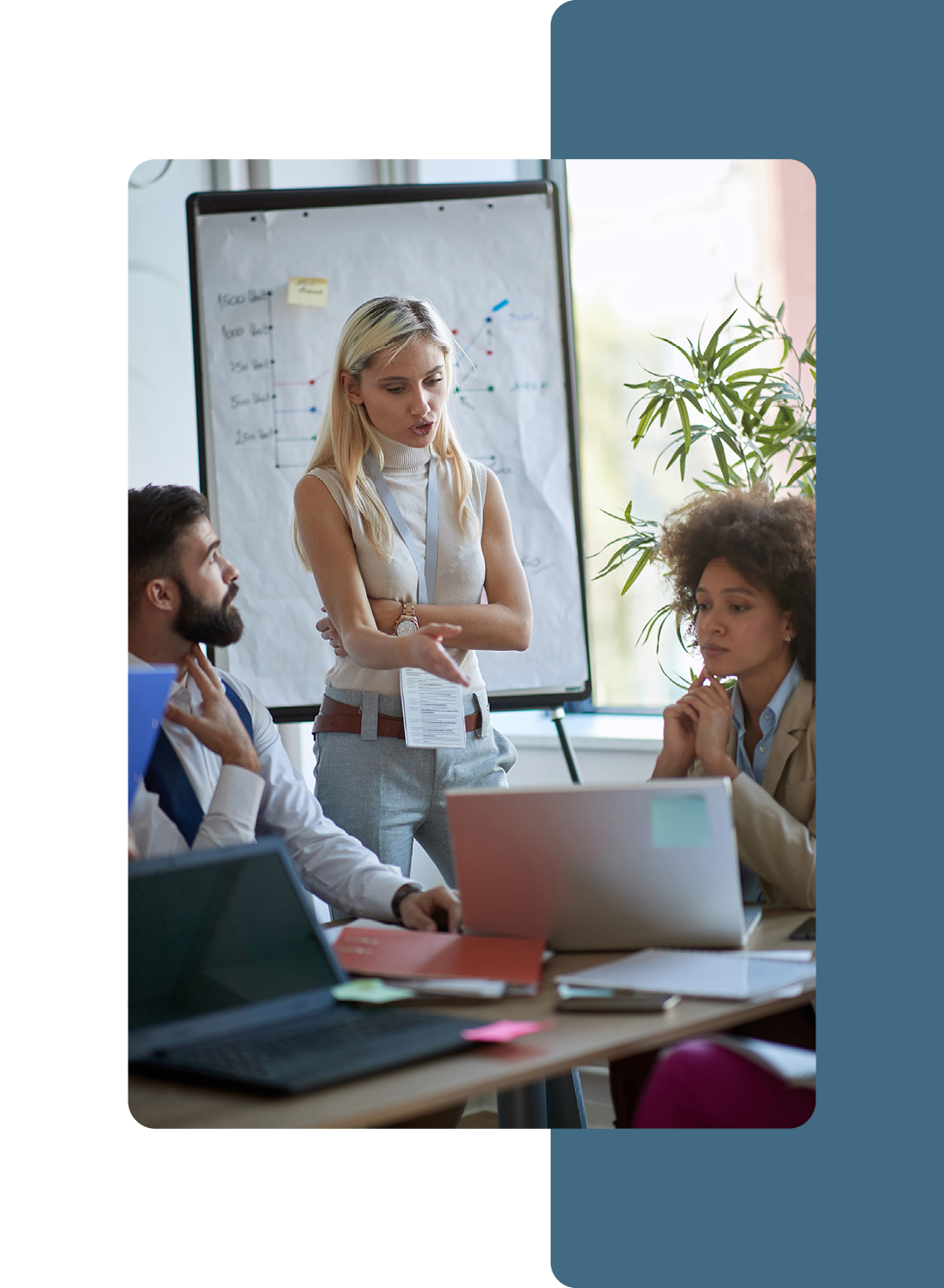 Image of a group of colleagues working together in a meeting