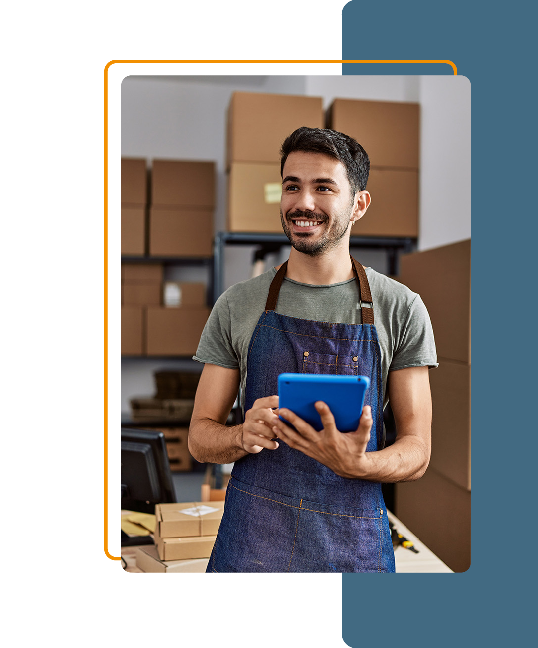 Image of a person working on a tablet in a distribution centre