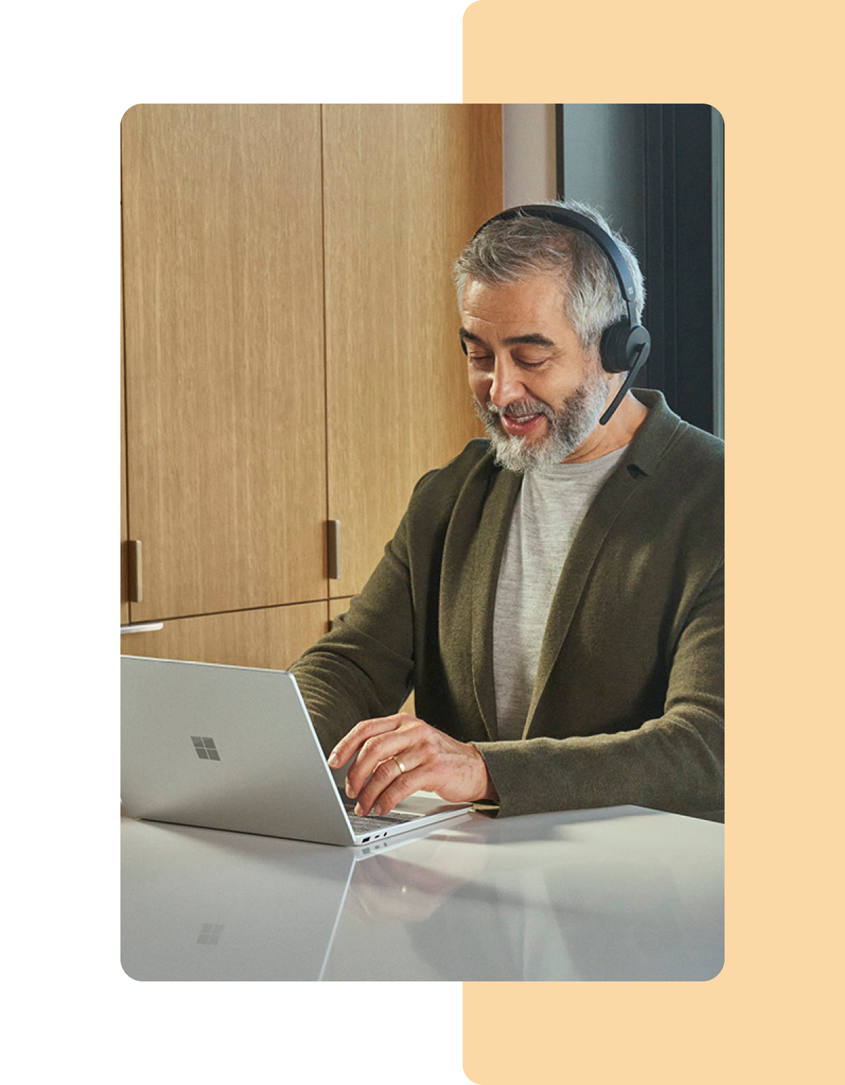 Image of a person working remotely on a Microsoft Surface laptop