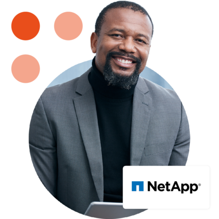 Image of a smiling business professional holding a tablet with the NetApp logo