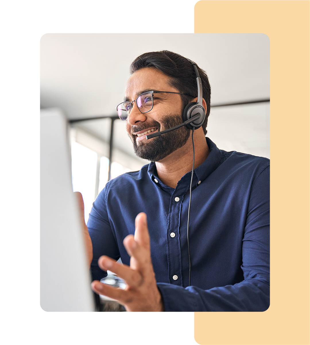 Image of an IT support professional talking on a headset