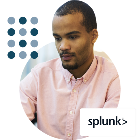 Image of a business professional working on a laptop with a Splunk logo