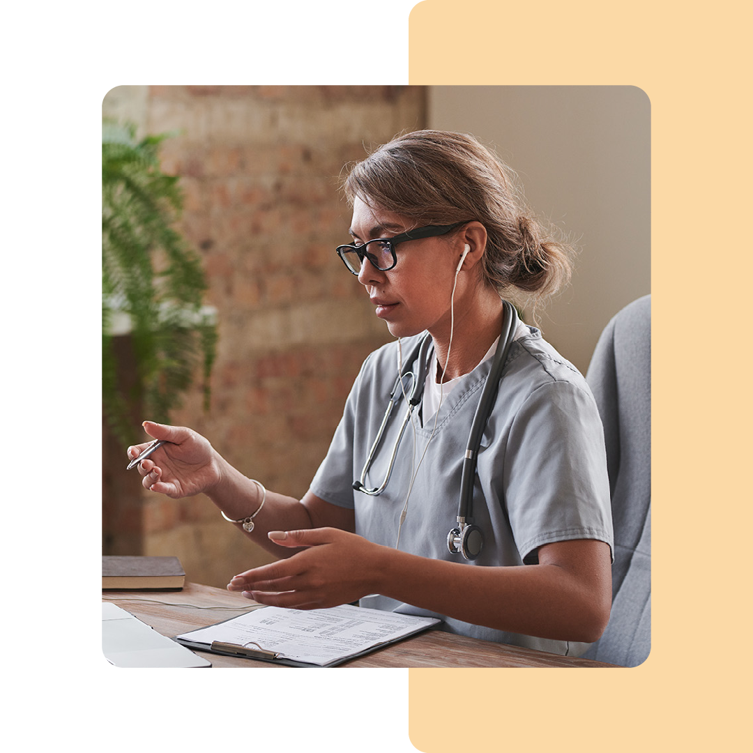 Image of a doctor talking on a virtual meeting