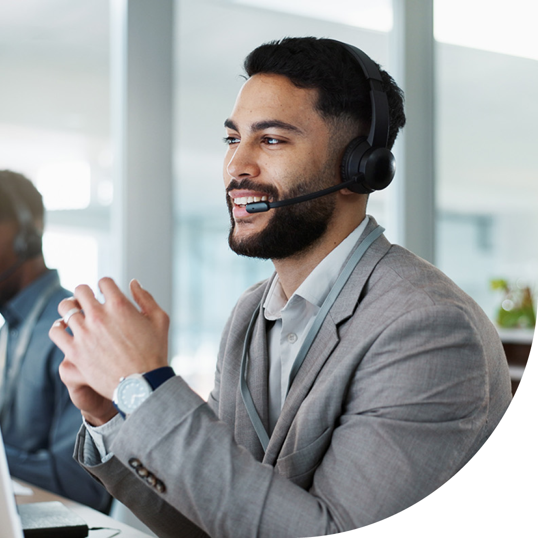 Image of an IT support professional talking on a headset