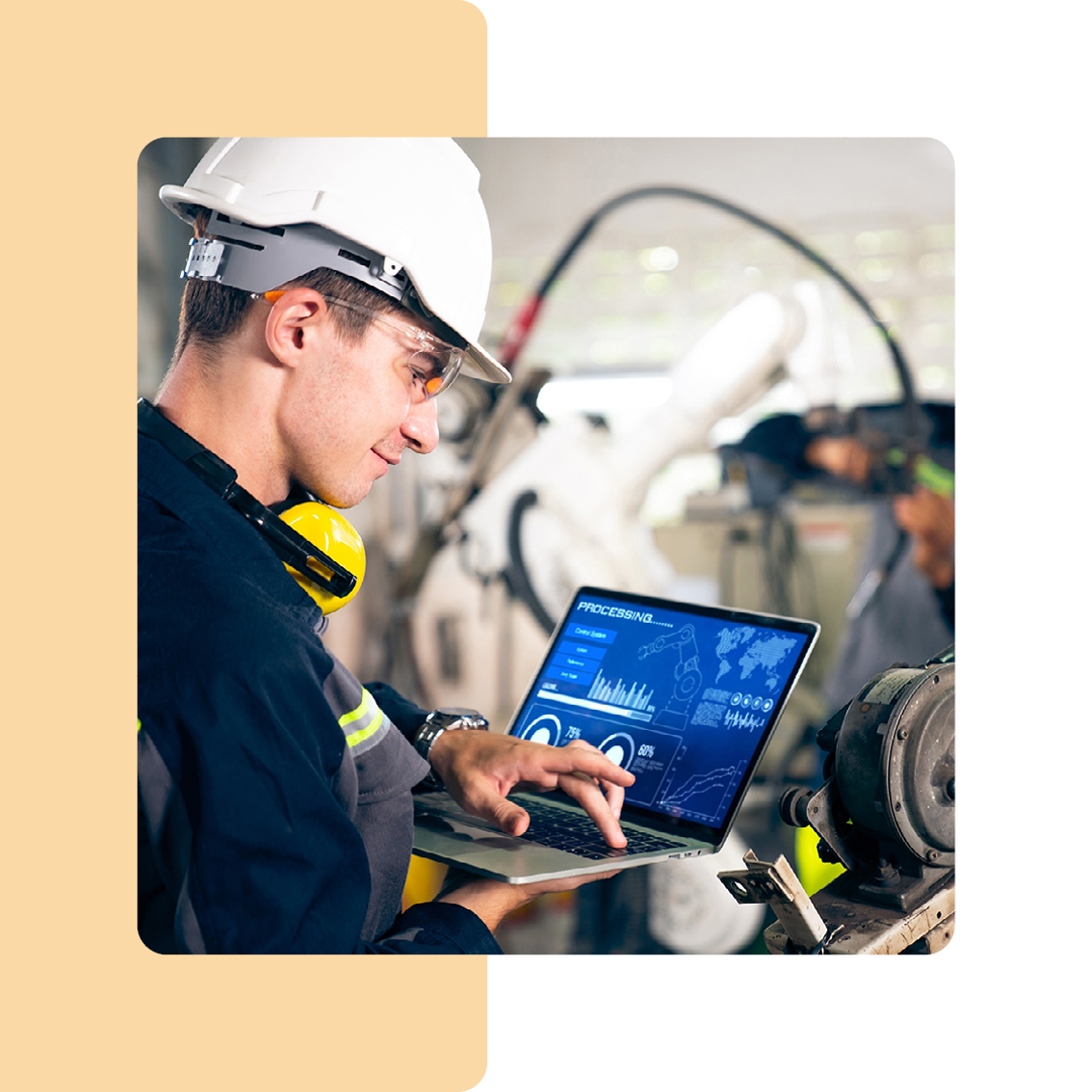 Image of a factory worker utilising the Internet of Things on a tablet