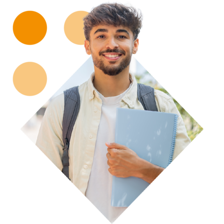 Image of a smiling university student holding a laptop