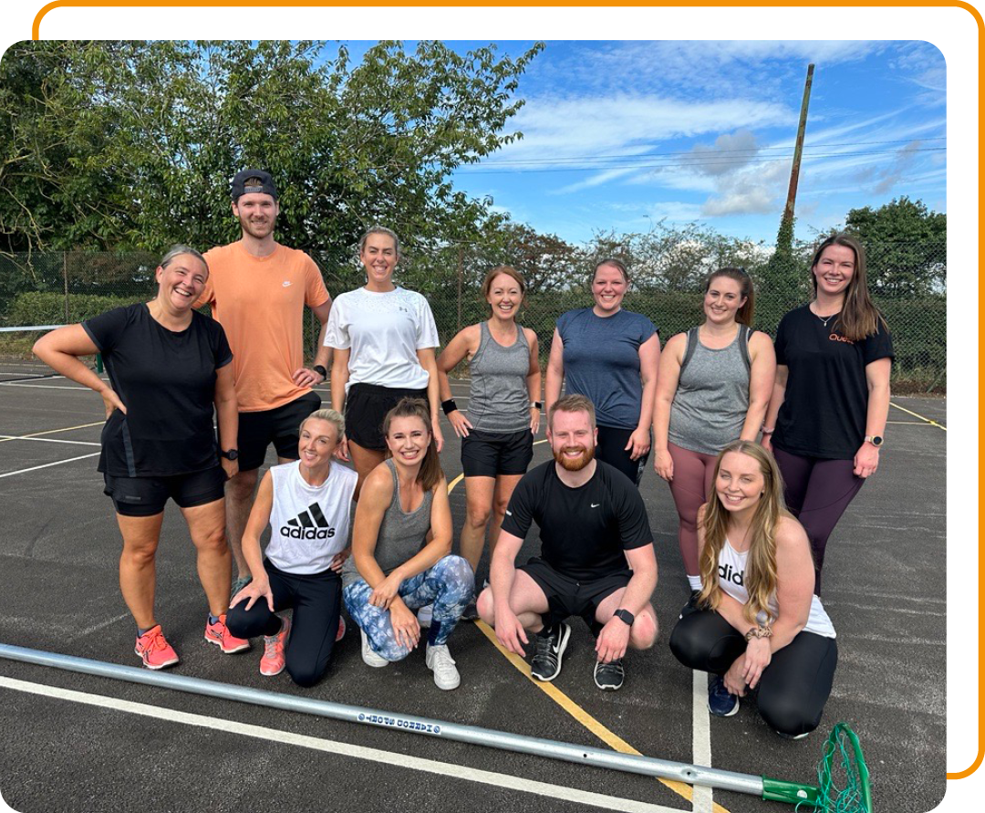 Image of Phoenix Software employees at a charity netball match